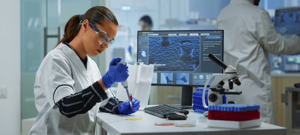 Scientist using a pipette in a laboratory setting